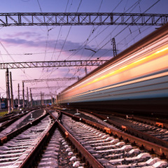 Image shows a fast passing train at night 